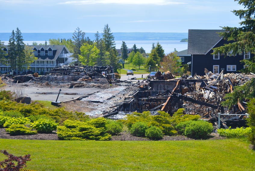 Shown above in this file photo are the still-smoking remains of the Inverary Resort’s main building, lost in a fire on June 7. A hydrant near the structure wasn’t working on the night of the fire.