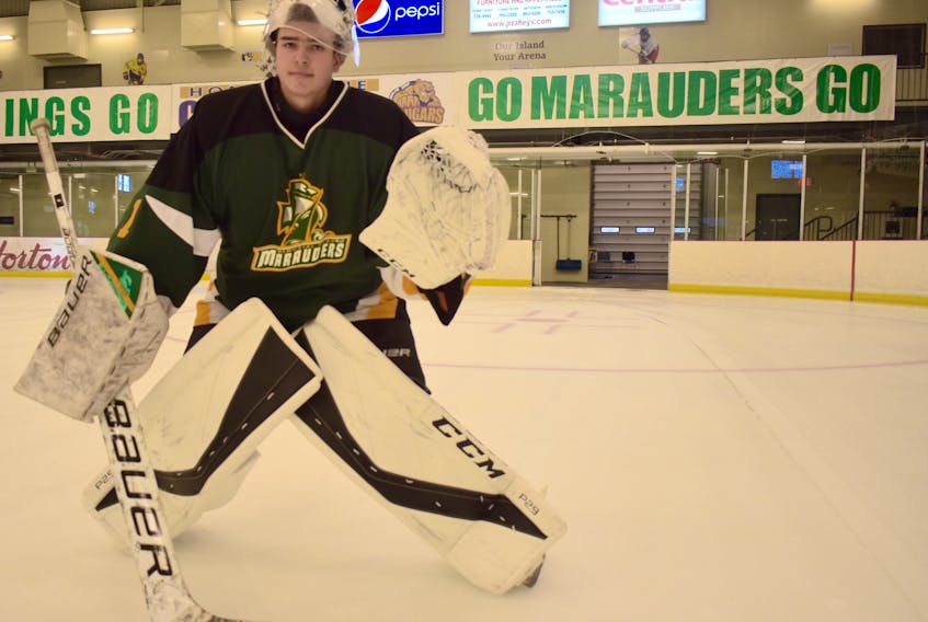 Spencer Shebib of the Memorial Marauders warms up prior to a team practice at the Emera Centre Northside in North Sydney on Monday. Shebib, a Grade 12 netminder, will play in his final home tournament of his high school career this weekend when Memorial High School hosts the annual Mae Kibyuk Memorial Green and Gold Hockey Tournament.