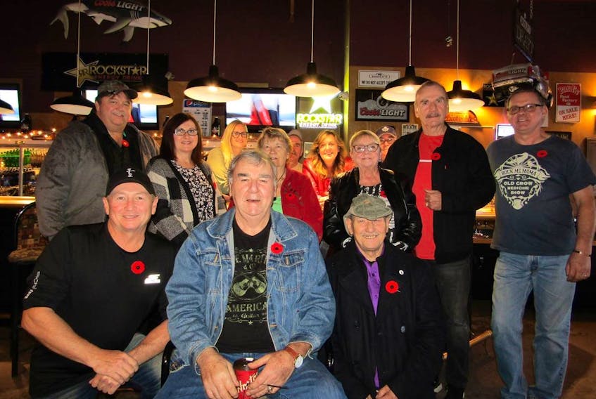 Northside Christmas Daddies volunteers are ready for another year of fundraising. From left, front row, Ward Glogowski, Bob MacDonald and Carl Abraham; second row: Eddie and Brenda MacDonald, Mia MacDonald, Rose McGuigan, Peter MacDonald and Kenny Cox; third row: Cathy Garland, Blair Gillis, Mia Patterson and Danny MacDonald.