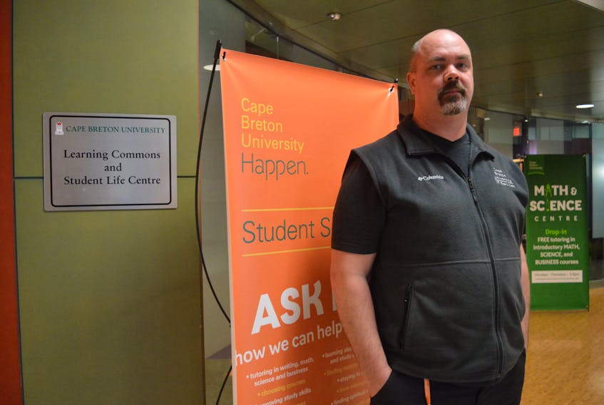Darren MacKinnon, CUPE Local 3131 president, stands inside the Martin Harvey building on CBU campus. The union voted 96 per cent in favour of a strike mandate for support staff at CBU if an agreement on their new contract cannot be made when the two sides meet with a conciliator on Feb. 13.