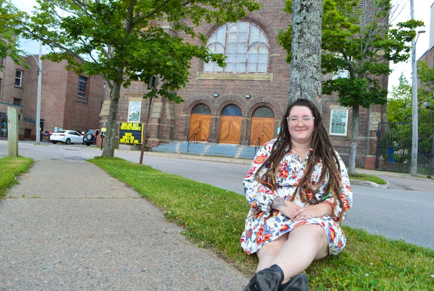Kayla Cormier, 25, of Whitney Pier, at the Highland Arts Theatre in Sydney, where she’s employed as a production technician. Cormier said she’s pansexual and although there’s still a stigma attached, she’s content in her heart now, having found herself.