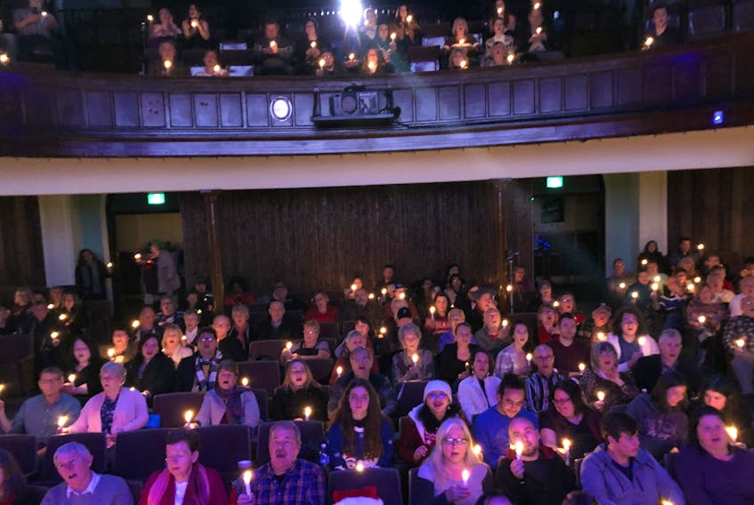 If you want to get Cape Bretoners out during the Christmas season, mention there will be a singalong. Shown here is a full house at the Highland Arts Theatre in downtown Sydney during its annual Christmas Eve singalong event.
