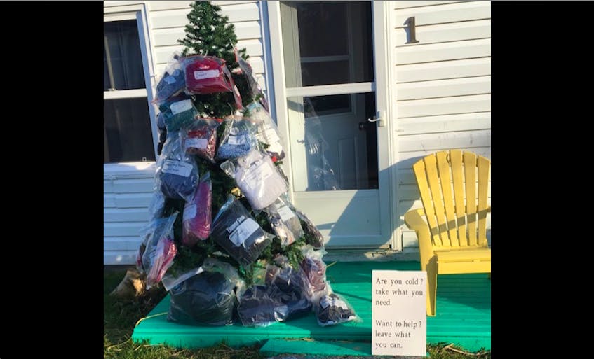 For the second year-in-a-row, Nicole MacPherson has placed a Christmas tree in front of her North Sydney home with bags of warm clothing for people in need.