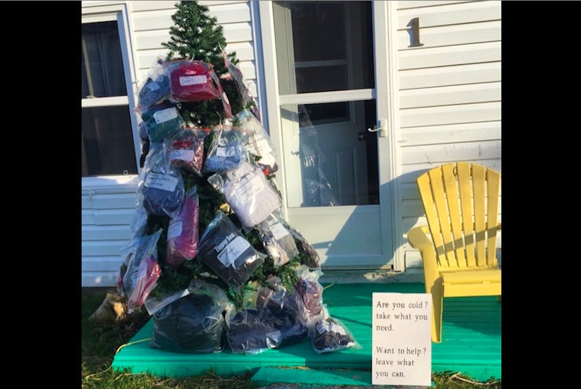 For the second year-in-a-row, Nicole MacPherson has placed a Christmas tree in front of her North Sydney home with bags of warm clothing for people in need.