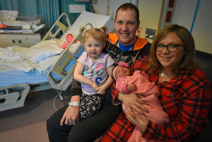 The Graham family from Glace Bay welcomed baby Ella Jean Graham at 12:14 a.m. on Tuesday, making her the first baby born in Cape Breton in 2019. Ella is in her mother Tiara Graham’s arms. Her father, Colin Graham, sits next to them with her big sister, two-year-old Quinn Graham, on his lap.