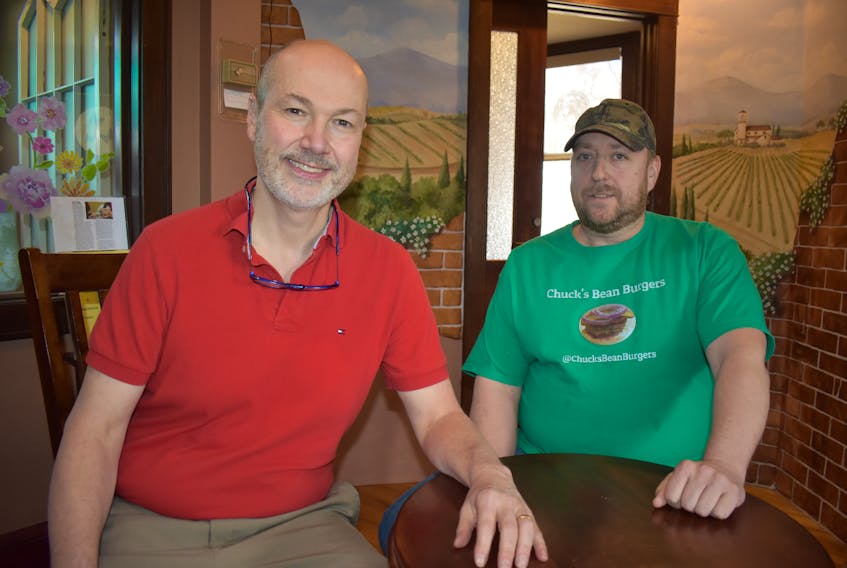 Sydney chiropractor David Dunn, left, and Chuck Zwicker, owner of Chuck’s Bean Burgers, launched a Facebook page a little over a week ago to educate the public on the real cost of using self-checkouts that are now available at most major retailers in Cape Breton.