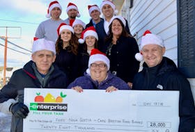 It was smiles all around when employees from Enterprise Rent-A-Car presented a cheque for $28,000 to local food banks to help address local hunger. Shown here from left to right, front row, are Lawrence Shebib, chair of the North Sydney Food Bank, Michelle Kalbhenn, co-ordinator of the Glace Bay Food Bank and Marco Amati, executive director of the Inner City Churches Loaves and Fishes Society. In the second row, left to right are Enterprise employees, Rebecca Benvie, Wendy Rhodes, branch manager and Juanita Currie, business rental sales executive. In the back row are Enterprise employees Ryan James, Rene Thibodeau, Laura Doucet, Billy Gouthro, assistant manager and Steven Comeau, area manager.