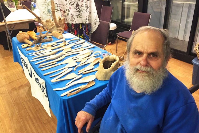 Woodworker Terron Dodd is shown with his wooden spoons that he regularly sells at craft markets around the region.