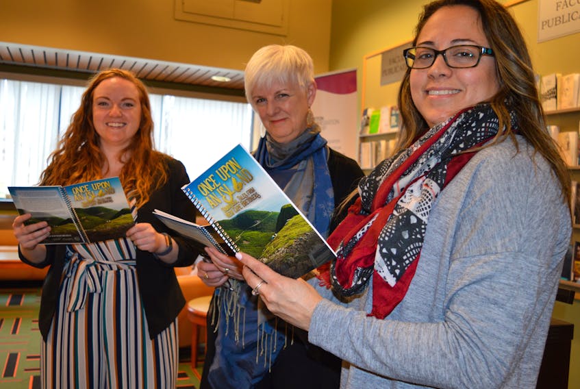 “Once Upon an Island” was unveiled Thursday at the Cape Breton University library as part of the Isle of Story Festival. The book features stories brought to Cape Breton by people who moved here from other countries. From left, Kathleen MacLeod, program co-ordinator for the Cape Breton Local Immigration Partnership, Rosalie Gillis, from the Cape Breton Regional Library, and Perla MacLeod, one of the book’s contributors, attended the book launch. The book is a project of the immigration partnership, regional library and the Cape Breton Partnership. Thursday’s launch included the sharing of traditional tales from India, told by CBU international students. The Isle of Story Festival continues until Saturday.