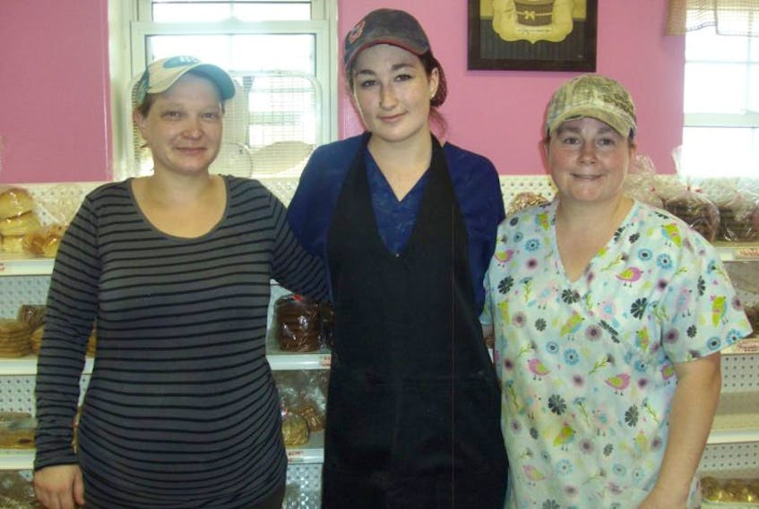 Pictured above from the left is Jody Oakes, owner of bakery “Gloria’s Goodies” and her staff, Holly Nicholson and Kelly Nicholson, mother and daughter.