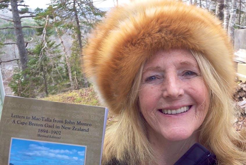 Bev Brett holds a copy of her book, “Letters to Mac-Talla from John Munro — A Cape Breton Gael in New Zealand 1894-1902.”