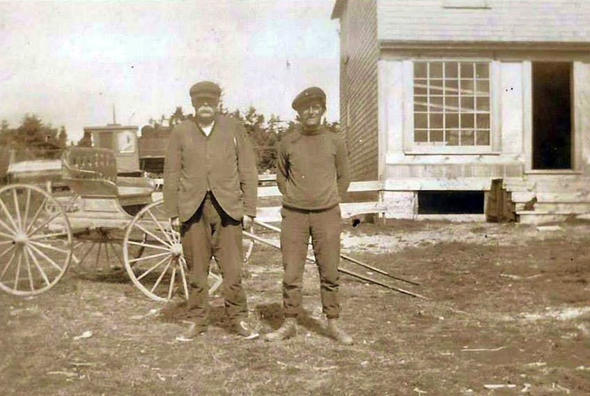 A small hotel and bunkhouses for workers, as well as a general store were constructed at the Hiawatha Mine site. Harvey Boutilier and Neil MacAulay stand in front of the store in this photo from the early 1900s.