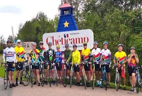 Some of the riders from a previous Ride to Recovery around the Cabot Trail include, from left to right, Paul MacNeil, John Saunders, Colette Smith, Billy Smith, Chris Heij, Yvonne Fougere, Ian Kennedy, Jeff Cadegan, Dr. Art Spencer, Dr. Michael Gallivan, Steven Butler, Dr. Kent Cadegan and Sharon Collins. This is the 14th year Cadegan has organized the ride to raise awareness on childhood sexual abuse.