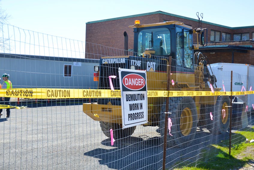 The demolition of the former Glace Bay Post office on Main Street, Glace Bay, is underway with B. Curry & Sons Construction Ltd. beginning with the removal of asbestos in the building.