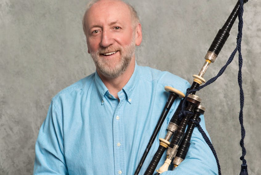 Piper Barry Shears is shown with his favourite instrument, the bagpipes.