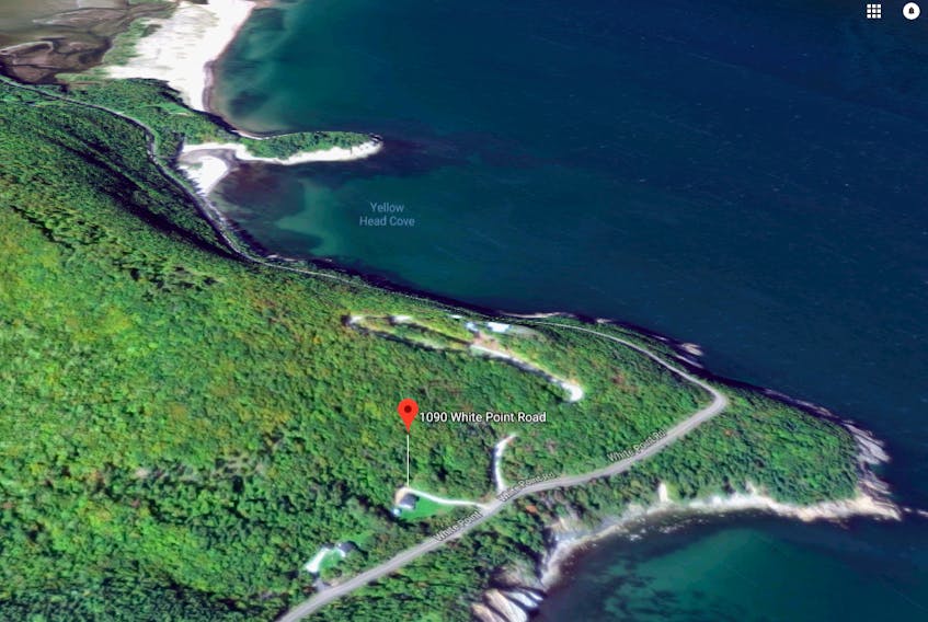 This satellite photos shows donated property in a coastal area in northern Cape Breton that Acadia University wants to sell. The property includes a five-bedroom home and eight hectares of land.