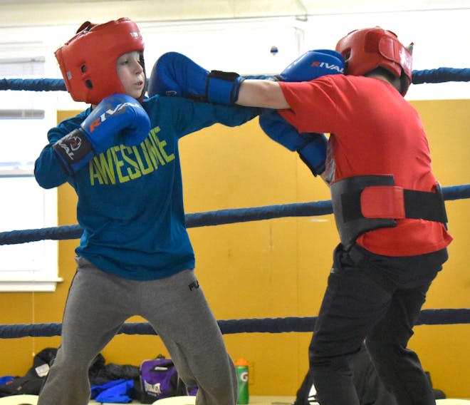 Noah Heffernan, left, of the Ring 73 Boxing Club, throws a punch at Anderson MacDonald during a training session at the Glace Bay club on Monday. Heffernan will put his 10-0 record on the line when he participates in Rumble in the Hub at Ring 73 Saturday, April 6, 2019.
