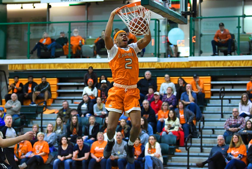 Eugene Kankue of the Cape Breton Capers men’s basketball team dunks the ball during Atlantic University Sport action at Sullivan Field House on Jan. 26. The Capers men’s and women’s teams will return to the court Saturday, Feb. 3, 2019 when they host the Saint Mary’s Huskies at 6 p.m. and 8 p.m. at Cape Breton University.