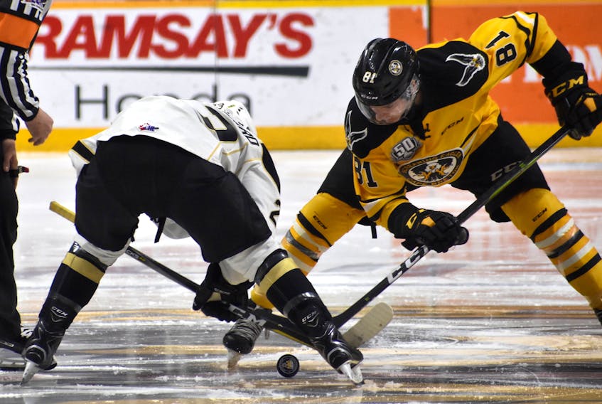 Mathias Laferrière of the Cape Breton Screaming Eagles, right, takes the face off with Zachary Beauregard of the Charlottetown Islanders during a Quebec Major Junior Hockey League regular season game earlier this month at Centre 200 in Sydney. Cape Breton and Charlottetown will meet in the first round of this year's QMJHL President Cup playoffs, beginning Friday in Prince Edward Island.