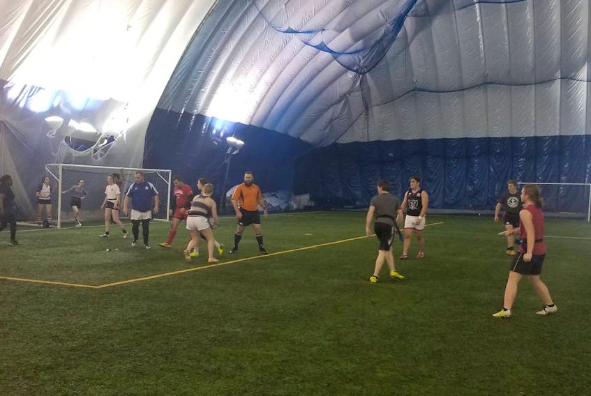 Local rugby players are shown participating in a game of flag rugby recently at the Cape Breton Health Recreation Complex Dome. Submitted photo.
