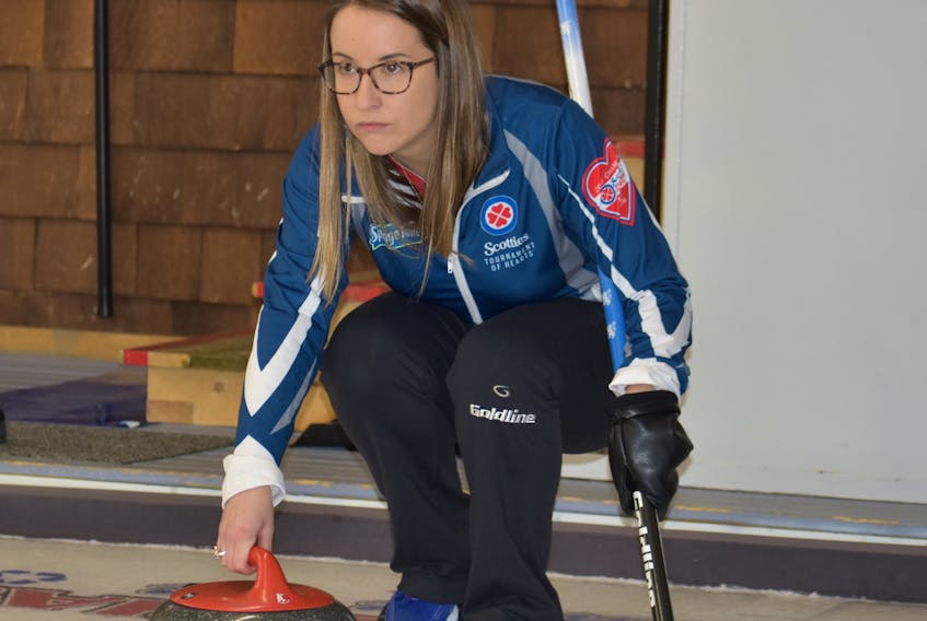 Christina Black of Sydney River prepares to throw a curling rock during media day for the Scotties Tournament of Hearts at the Sydney Curling Club last month. Black hopes to represent Nova Scotia at the 2019 Scotties Tournament of Hearts in February in Sydney.