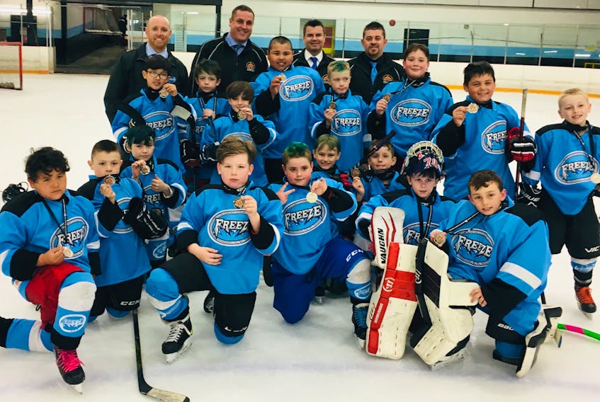 The Cape Breton Freeze captured a silver medal at the recent 2019 Atlantic Hockey Group Novice ‘AAA’ playoffs. Front row, from left: Grazen Gould, Cam Marshall, Quinn MacEachern, Ryder Walker, Austin Miller, Leland Macdonald, Jacob MacKinnon, Chayce Hurley and Cailex Tournidis. Second row, from left: Seth Black, Parker Spencer, Isaac Ward, Blair Francis, William Clarke, Kennan Francis, Colton Jeddore and Connor MacLean. Back row, from left: coaches Chris Ward, Dave Black, Rob Matheson and Chuck Miller. SUBMITTED PHOTO/CHRIS TOURNIDAS
