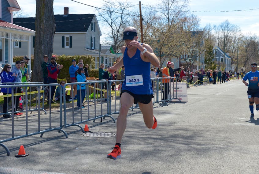 James MacLellan of Sydney finished first overall in the 41st annual GoTolnsure.ca Fredericton Marathon earlier this month in Fredericton, N.B. MacLellan finished the race with a time of 2:29:41. In total, 222 runners participated in the event’s full marathon. SUBMITTED PHOTO/HEIDI MACLELLAN