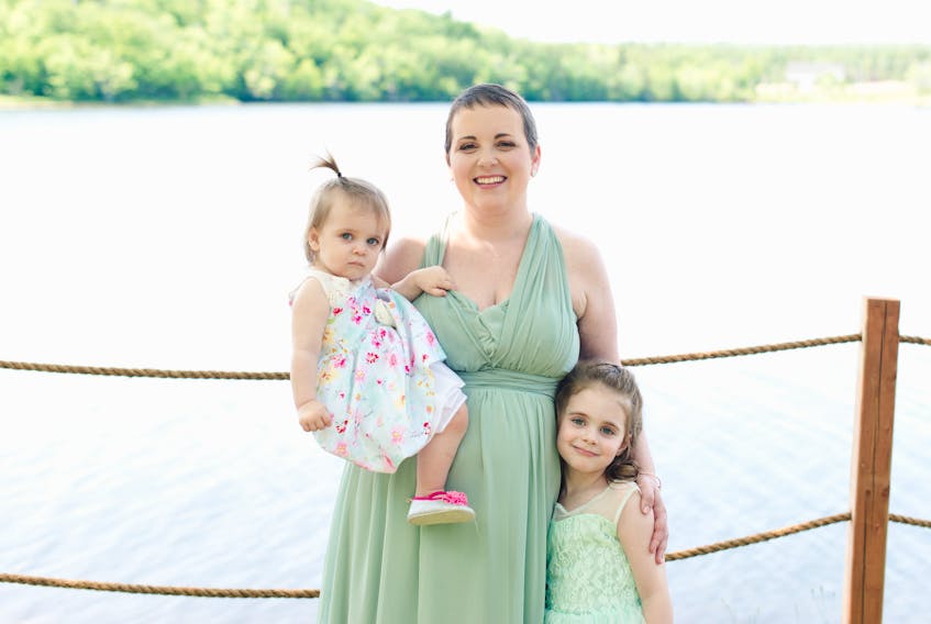 Danielle Mackinnon-Allen, with her daughters Kinsely and Aselin at her sister's wedding this summer. Danielle lives with a brain tumor(grade 3 astrocytoma), but wants to make sure she can positively impact Cape Breton with this disease. JEN HARDY PHOTO