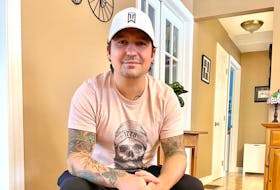 Brian Burton, shown, and his brother Adam are co-founders of Down North Apparel. The company has created clothing with themes common to Cape Breton and is donating a portion of sales to island charities and non-profits.