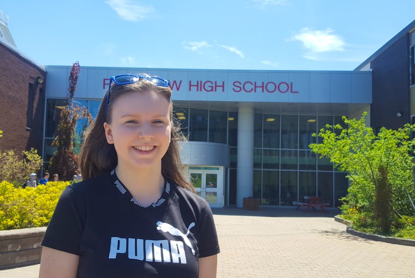 Here is a photo of Grace Campbell in front of her school, Riverview High School, where she is Co-President of the MEtoWE club as well as Co-Executive of the Interact Club. CHLOE SYMS/SPECIAL TO CAPE BRETON POST