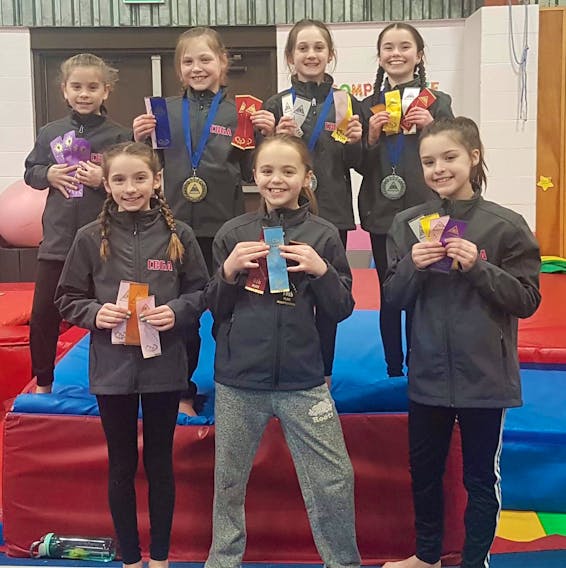 Athletes from the Cape Breton Gymnastics Academy competed at the Halifax Alta Gymnastics Club on March 2-3 and won awards in all four categories: vault, bars, beam and floor. Front row, from left, are Addison Hussey, Julia MacDonald and Lila Boudreau. Back row, from left, are Chloe Huntington, Charley Sawlor, Ava MacDonald and Rachel Moore. SUBMITTED PHOTO/CBGA