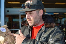 Ashley MacIsaac is seen outside NSLC story in Sydney River this morning after purchasing cannabis on the first day of legal sales in Canada.