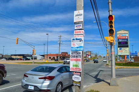 Unauthorized signs on utility poles in CBRM must be removed by August 1st
