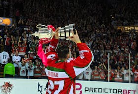 Cardiff Devils forward Joey Haddad lifts the playoff trophy in front of the hundreds of Devils fans at the Nottingham Arena in April of this year. It was the first playoff championship for Cardiff since 1999.