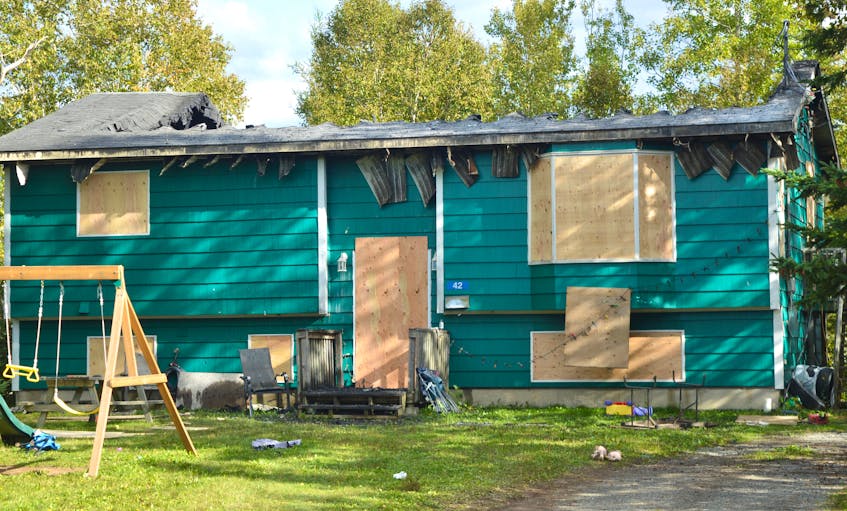An overnight fire Monday in the roof area at 42 Pi’kuin Ave. in Membertou caused extensive damage to this home. Five people escaped the blaze.