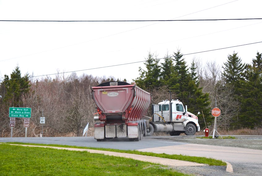 A Donkin coal truck turns from Long Beach Road in Port Morien onto Highway 255 towards Dearn’s Corner. Port Morien residents say the roads aren’t wide enough for these trucks and they have difficulty making this turn.