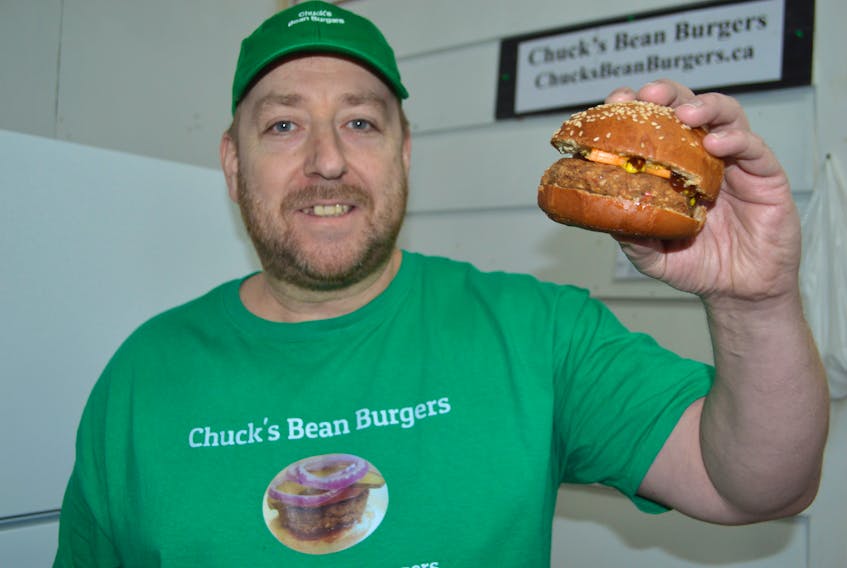 Chuck Zwicker, 48, owner of Chuck’s Bean Burgers, cooks some of his original bean burgers at the Farmers Market in Sydney. Zwicker originally created the nutritious burger option after no longer being able to eat red meat or pork and due to encouragement started the business which now includes different varieties including bean & tuna, bean & BBQ chicken, bean & steak, a reduced gluten option and will have bean & salmon in the near future.