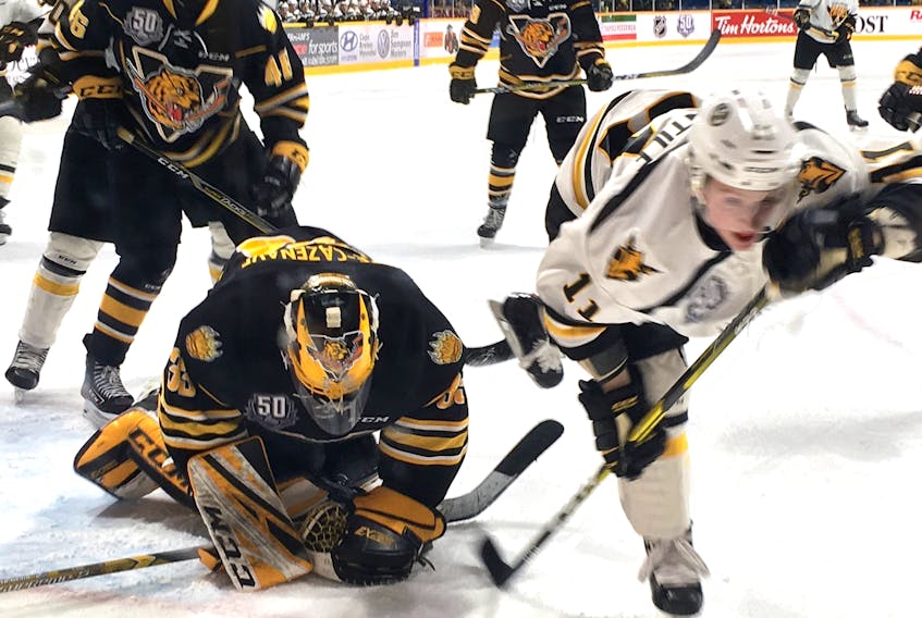 Screaming Eagles player Derek Gentile, right, skates away after a shot is stopped by Tristan Côté-Cazenave of the Victoriaville, Tigres during Quebec Major Junior Hockey League first period action Saturday afternoon at Centre 200.