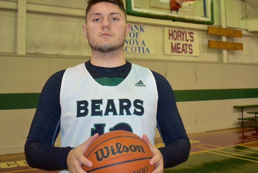 Dylan Messervey of the Breton Education Centre Bears stands on the court at the BEC gym on Thursday. The New Waterford native will play in his final Coal Bowl Classic tournament this week.