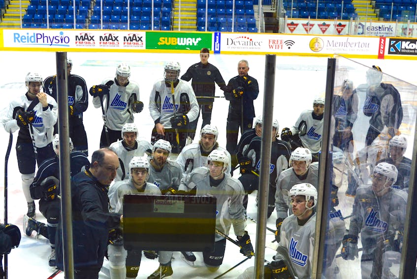 Cape Breton Screaming Eagles head coach and general manager Marc-André Dumont addresses his team at a practice at Centre 200 on Wednesday morning. Following practice the team boarded a bus bound for Rimouski, Que. where they will open their second round playoff series versus the Oceanic on Friday night.