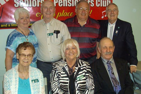 Columnist Gordon Sampson was invited to be a guest speaker recently at the North Sydney Seniors & Pensioners Club. Front row, from left, are club president Minnie Piercey, first vice-president Shirley Laffin and second vice-president Hugh MacPhee. Back row, from left, are secretary Yvonne Ferguson, sergeant-at-arms Stan Drake, treasurer and master of ceremonies Cyril Keeping and Sampson.