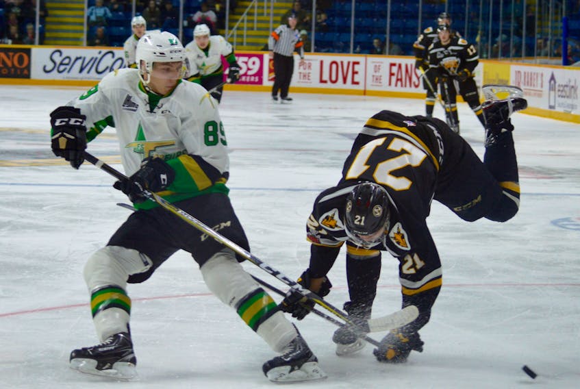 Benjamin Dion of the Val-d'Or Foreurs, left, upends Peyton Hoyt of the Cape Breton Screaming Eagles on Sunday at Centre 200. Hoyt finished with two goals in a 4-2 win.