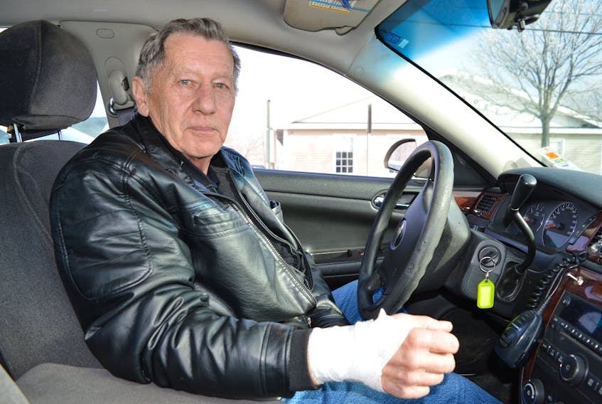 Reggie Jewer of New Victoria, a cab driver with Midway Taxi in New Waterford, is still healing from bite wounds to the head and arm after being viciously attacked by a dog that got in his car while picking up a passenger in River Ryan, Feb. 22.