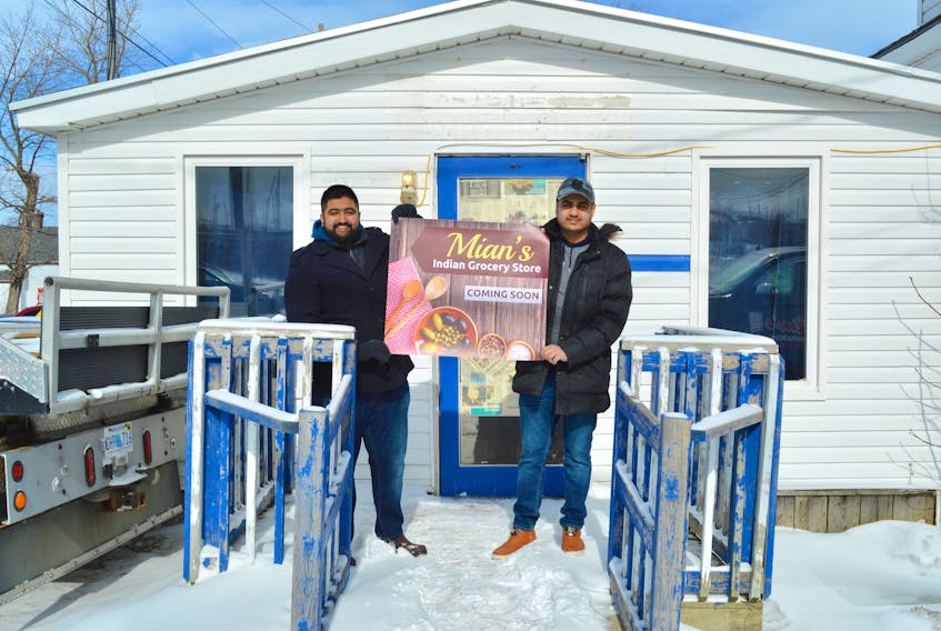 Brothers Athar Ahmad, left, and Aamir Ahmad at the location of their latest business venture, Mian’s Indian Grocery Store, which is slated to open around the end of March. The shop, now under renovations, is located at 455 Grand Lake Rd. in Sydney.