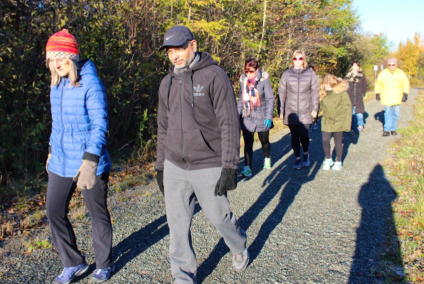 Former radiation patient Chantal Coulombe and Dr. Waseem Sharieff recently took part in a Walk with a Doc through Rotary Park in Sydney.