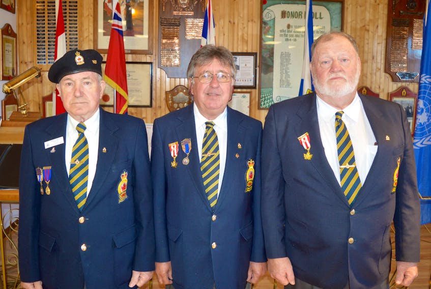 Royal Canadian Legion branch 83 members, from left, Sgt.-at-arms Frankie Sampson, Cecil Snow, second vice-president, and Daniel Ginter, third vice-president, gathered at the legion on Monday. The legion will host a D-Day ceremony at the Florence location on Wednesday and the general public is welcome to attend.