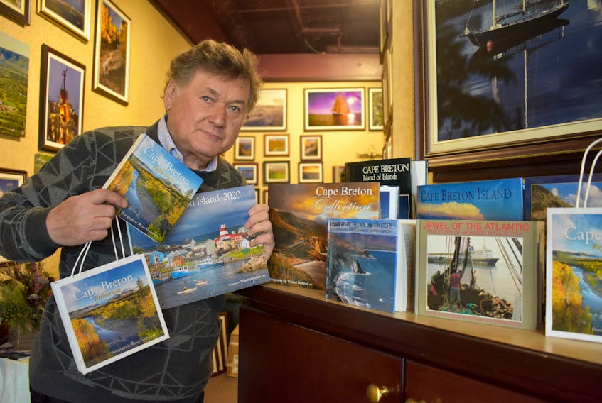 Warren Gordon holds his latest book and calendar which will be launched Thursday at the Old Triangle Ale House, 424 Charlotte St., Sydney.