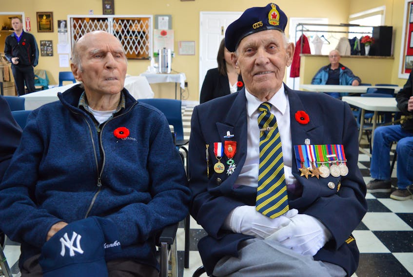 Second World War veterans Marshall Desveaux, left, and Joe Petrie are seen at 2017 D-Day ceremonies at Royal Canadian Legion branch 15 in New Waterford.