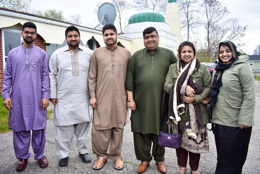 The Ahmad family, owner and operator of Mian’s Restaurant in Sydney, took Wednesday off to celebrate the end of Ramadan at the Bai’t-ul-Hafeez Mosque on Grand Lake Road. The Ahmads were joined by about 20 other members of the local Ahmadiyya Muslim community for morning prayers prior to a feast that marked the end of fasting and their first daylight meal in more than four weeks. Above, from left: family friend Farhan Kadri, Aamir Ahmad, Athar Ahmad, Mian Ahmad, Samina Ahmad and Sehrish Ahmad.