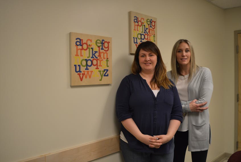 Tammy MacSween, left, and Holly MacInnis, members of the volunteer board of directors of the former Baddeck Nursery School, stand inside Baddeck Academy where the preschool was in this April file photo.